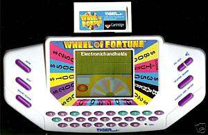 WHEEL OF FORTUNE TRAVEL HANDHELD TV GAME SHOW SYSTEM  
