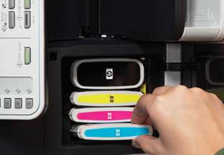 Ink cartridges are easy to access and replace. View larger .