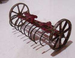 Vintage Arcade cast iron hay rake farm toy tractor equipment  