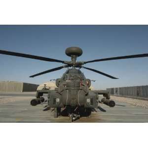 An Apache Helicopter at Camp Bastion, Afghanistan. by Stocktrek Images 