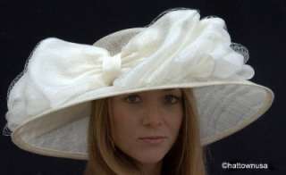 Sinamay Kentucky Derby Hat with huge taffeta bow covered with veiling 