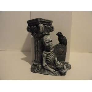Spooky Halloween Cement Skeleton At Pillar