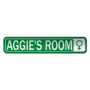   AGGIE S ROOM  STREET SIGN NAME