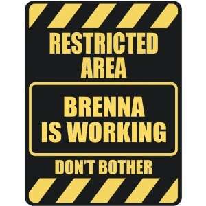   RESTRICTED AREA BRENNA IS WORKING  PARKING SIGN