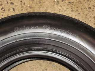 You are bidding on a Firestone Deluxe Champion 7.35 14 Tire. This is 