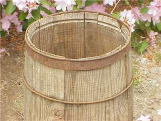 primitive barn wood nail barrel with metal bands and twisted wire use 