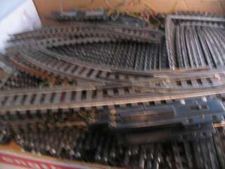   pieces, track connectors. Will require some cleaning but usable lot
