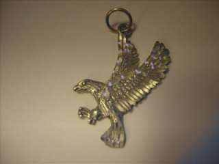 eagle pendant. Signed sterling with a © symbol and a bee hallmark 
