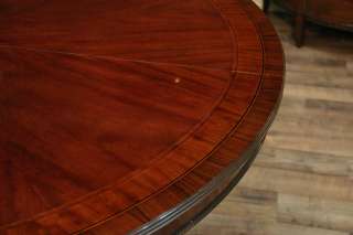 54 Round to Oval Mahogany Dining Table with Leaves  