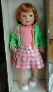Going Out is a 24 Toddler Doll with light skin tone. Auburn long 