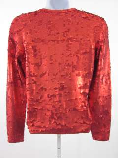 You are bidding on a WORTH Red Sequin Silk V Neck Shirt Top in a Size 