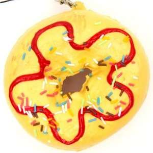  yellow big donut squishy charm with colourful sprinkles 