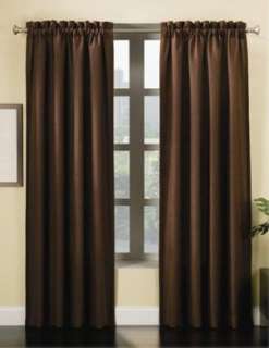 Brown curtains on a silver curtain rod