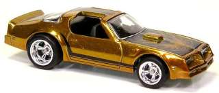 bird spectraflame gold black firebird on hood black stripes on roof 