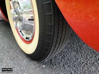 Tires are wide walls, in good condition, with original spinner center 