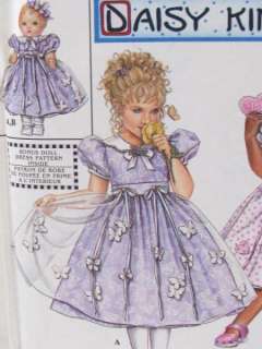 Daisy Kingdom Simplicity sewing pattern for a pretty little girls 