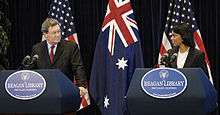 Rice and Australian Foreign Minister Alexander Downer participate in 