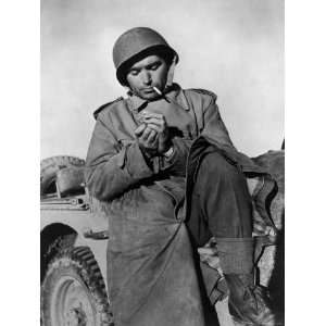  Photographer Robert Capa Pausing for a Smoke While on Duty 