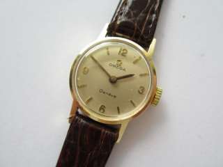 Omega 14k gold Geneve swiss 60s watch runs and keeps time  