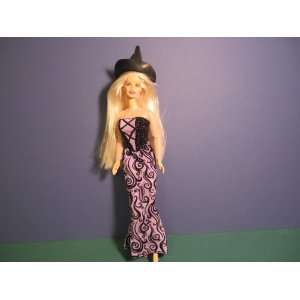  BARBIE WITH PURPLE OUTFIT AND HAT 