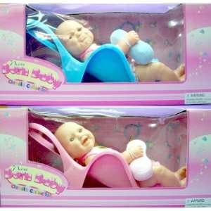   16 New Born Baby Doll in Plastic Baby Seat  2 Asst Toys & Games